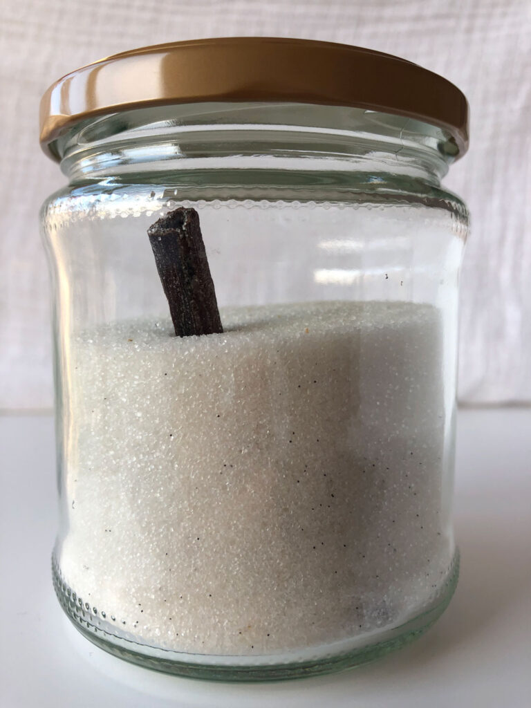 Homemade vanilla sugar stored in a sealed jar