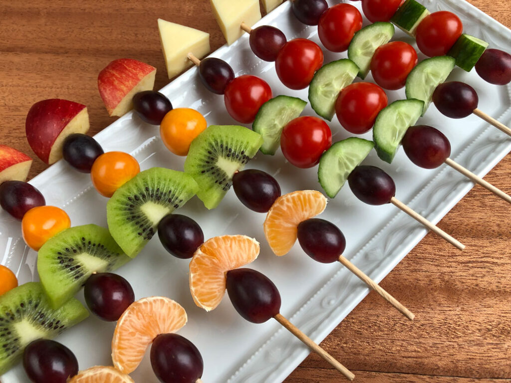 Fruit and vegetable rockets on a serving platter.
